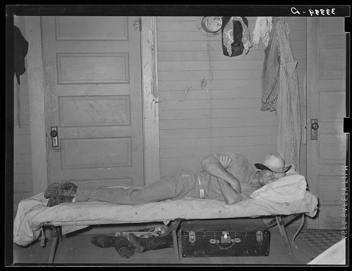 Cook of SMS Ranch asleep after dinner. Ranch near Spur, Texas