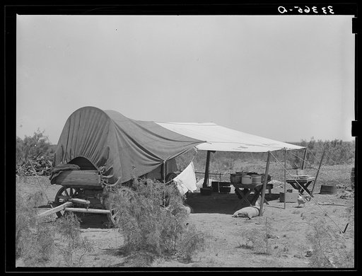 Chuck wagon and tarpaulin. Ranch near Spur, Texas