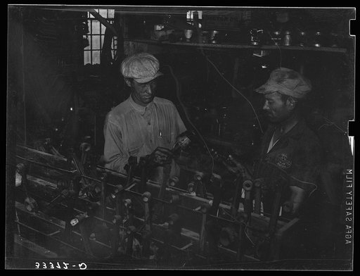 Untitled photo, possibly related to: Migrant steeple-jack buying a replacement connecting rod at secondhand automobile parts store. Prague, Oklahoma, Lincoln County