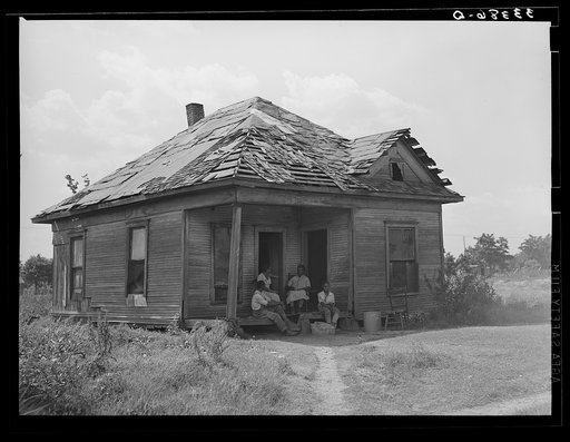Home of Negro agricultural day laborer's home in Muskogee County, Oklahoma. These houses rent from two to five dollars per month. Muskogee County, Oklahoma