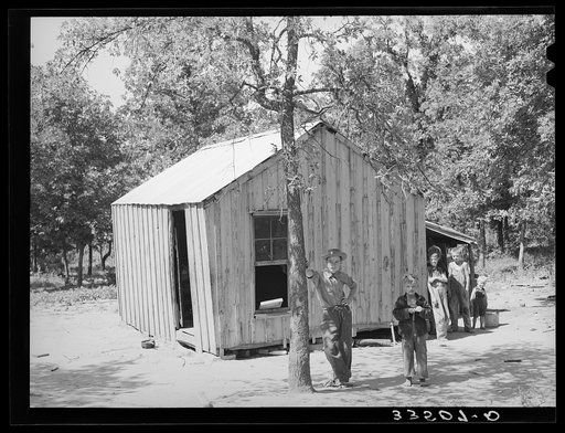 Home of former oil worker and miner. McIntosh County. He is now an agricultural day laborer