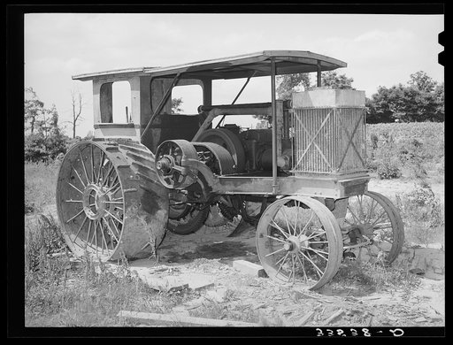 Old gasoline tractor on farm of Indian in McIntosh County, Oklahoma