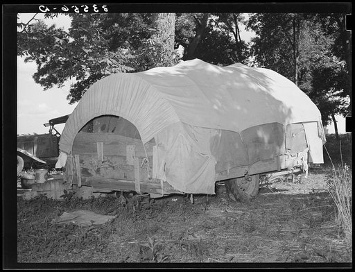 Covered wagon trailer home of migrant from Texas near Tullahassee, Oklahoma. Wagoner County