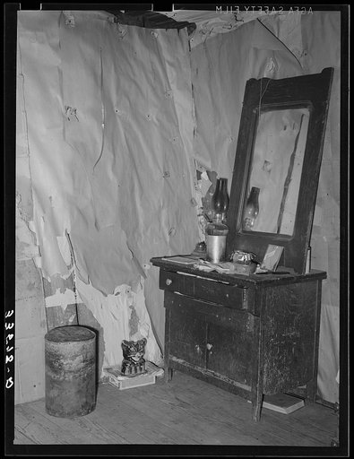 Corner of bedroom in agricultural day laborer's home in Wagoner County, Oklahoma