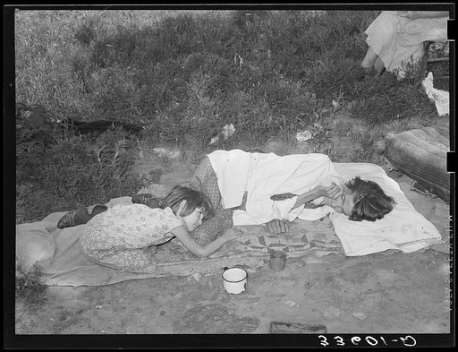 Tubercular wife and daughter of agricultural day laborer. She had lost six of her eight children and the remaining two were pitifully thin. The mother said that she had tuberculosis because she had always gone back to the fields to work within two or three days after her children were born. Shack ho