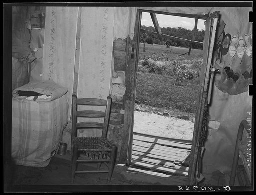 Interior of Negro agricultural day laborer's home near Vian, Oklahoma. Sequoyah County