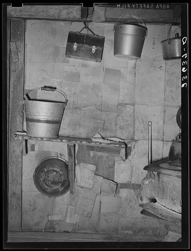 Detail of kitchen of home of Negro agricultural day laborer in Arkansas River bottoms. Near Vian, Oklahoma