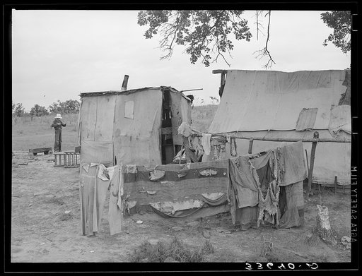 Clothes and tent of itinerant statue maker and agricultural day laborer living on Poteau Creek near Spiro, Oklahoma. Sequoyah County