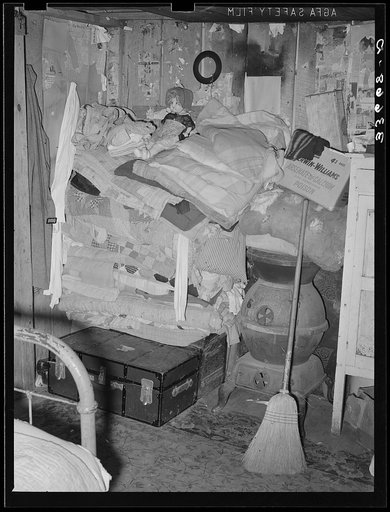 Interior of tenant farmer's bedroom. Arkansas River bottoms near Vian, Oklahoma