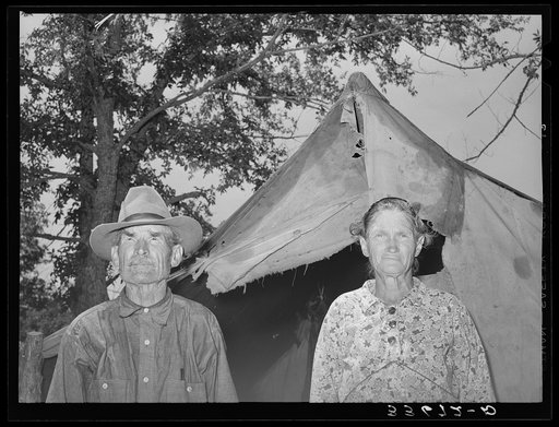 Old couple who have moved into tent home near Sallisaw, Oklahoma, in order to save rent and cost of wood in town