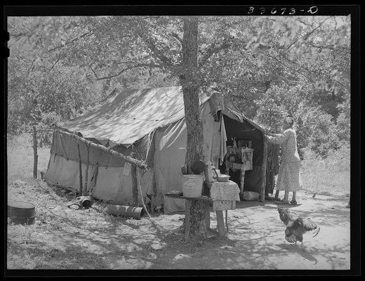 Home of old couple who have moved to tent home out of Sallisaw, Oklahoma, in order to save cost of rent and wood in town