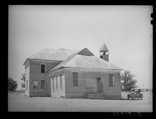 Old schoolhouse in Akins, Oklahoma. This town was formerly a cotton ginning center as well as trading center for the surrounding farm community. There is no ginning done there now and it has assumed the status of a ghost town