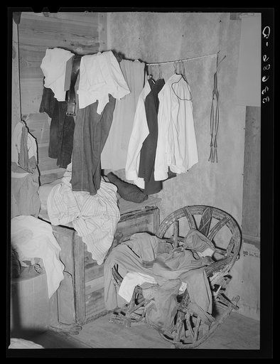 Corner of bedroom of tenant farmer's home near Sallisaw, Oklahoma