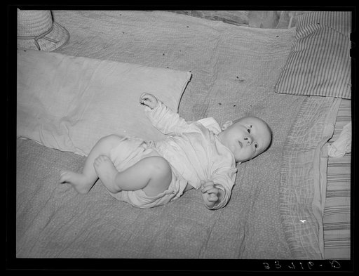 Baby of agricultural day laborer living north of Sallisaw, Oklahoma. Sequoyah County