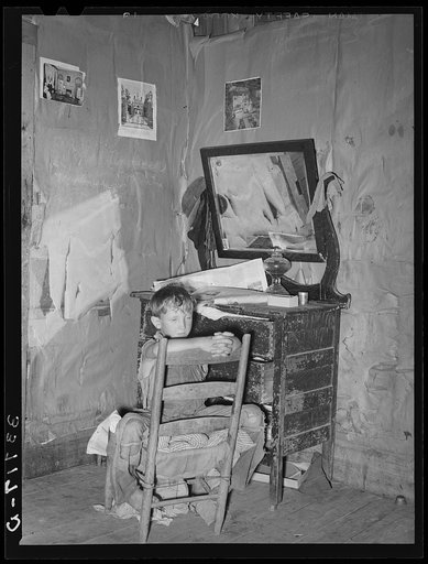 Corner of living room in home of agricultural day laborers living north of Sallisaw, Oklahoma. Sequoyah County