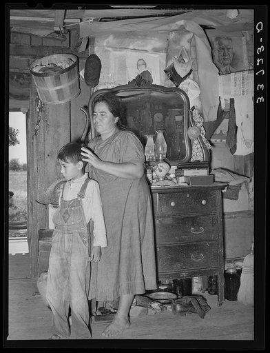 Indian mother and son, tenant farmers near Sallisaw, Oklahoma