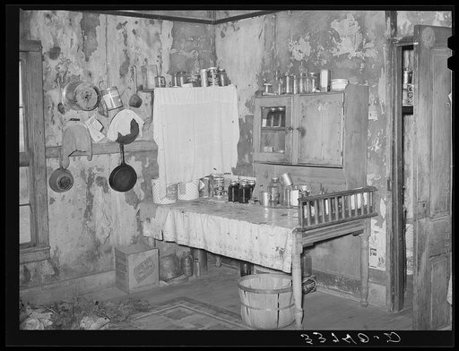 Kitchen in home of Negro agricultural day laborer living in small town in Muskogee County, Oklahoma