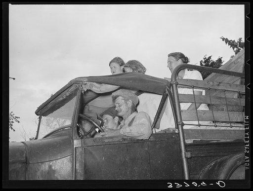 Migrant family in car enroute to California. Near Muskogee, Oklahoma