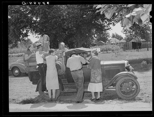 The Elmer Thomas family at Muskogee visiting their friends to say goodbye before leaving as migrants to California. Oklahoma