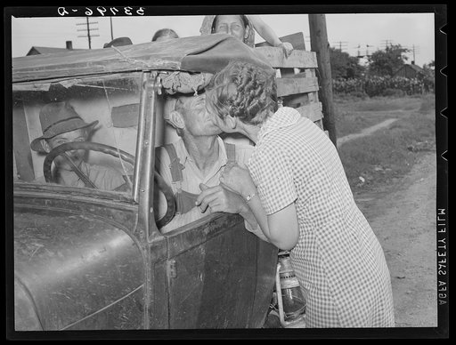 Kissing a relative goodbye. Muskogee, Oklahoma. Migrant family bound for California