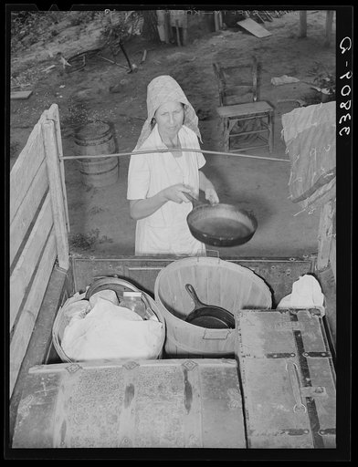 Untitled photo, possibly related to: Loading the truck of migrant family which will take them to California from Muskogee, Oklahoma