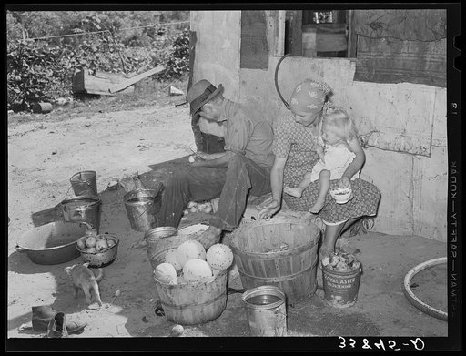 Family living in Mays Avenue camp. Oklahoma City, Oklahoma. This family had been farmers in Oklahoma until four years ago. Since then they have lived in community camp getting some food from the vegetable dumps, doing "trashing" and going on the road occasionally as migrant workers. They have been t