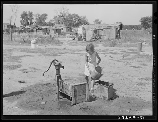 A well, water supply for about a dozen families at Mays Avenue camp. Oklahoma City, Oklahoma. See general caption 21