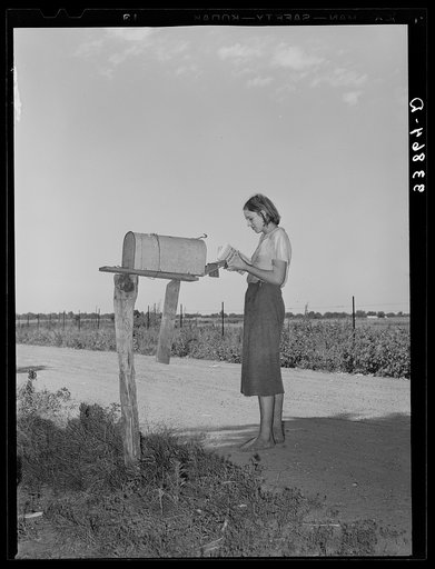 Daughter of tenant farmer living near Muskogee, Oklahoma, getting the morning mail. Refer to general caption number 20