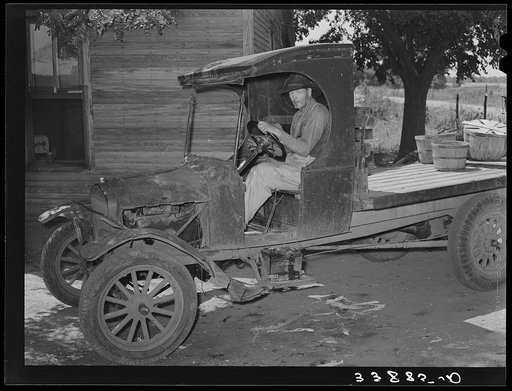 Tenant farmer in truck after returning from market in Muskogee, Oklahoma