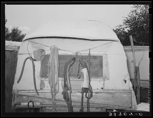 Harness and rope on back of covered trailer in Mays Avenue camp. Oklahoma City, Oklahoma