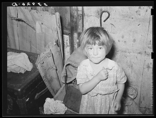 Untitled photo, possibly related to: Little girl in shack home in camp near Mays Avenue. Oklahoma City, Oklahoma. See general caption no. 21