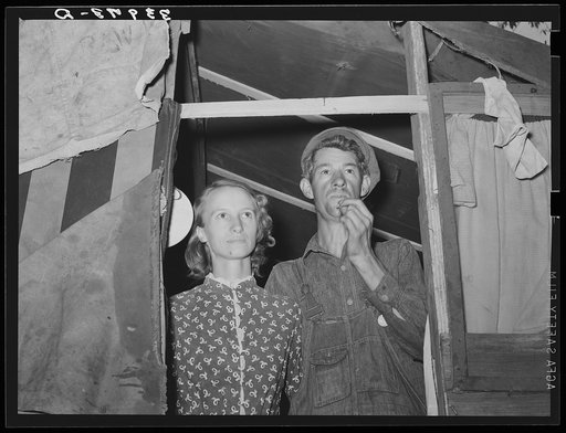 Young couple in doorway of their tent home. Community camp, Oklahoma City, Oklahoma. See general caption 21