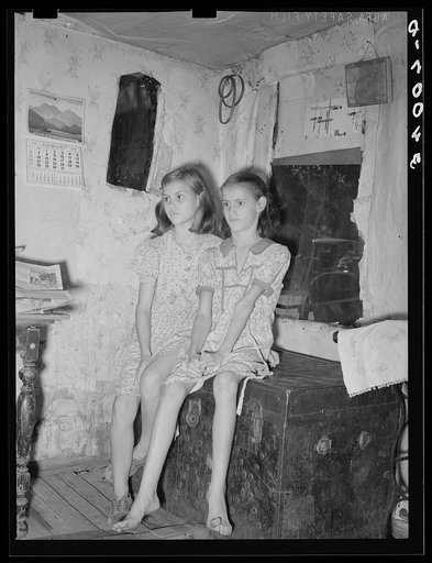 Untitled photo, possibly related to: Family living in community camp. Oklahoma City, Oklahoma. Father is in hospital with broken back received when he fell from roof on which he was applying shingles. See general caption 21