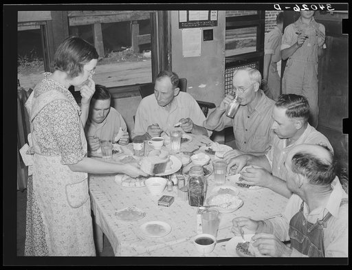 Pickets of striking oil workers' union eating lunch prepared by their wives at union headquarters. Seminole, Oklahoma