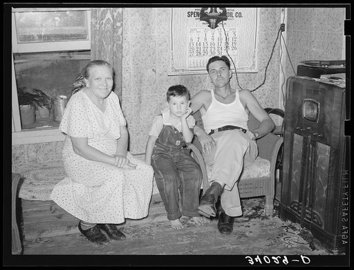 Untitled photo, possibly related to: Truck driver, his mother and son at home. Seminole, Oklahoma, oil fields