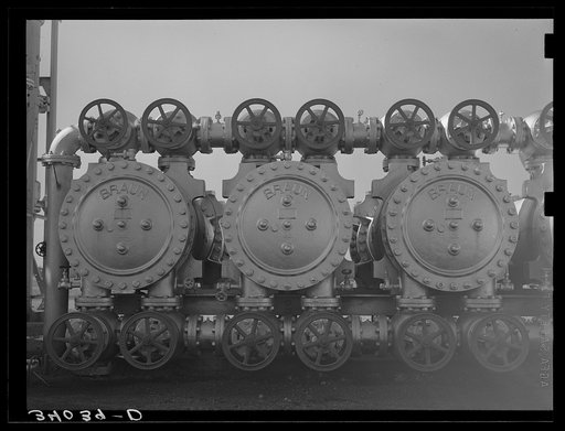 Untitled photo, possibly related to: Stills, valves. Oil refinery, Seminole, Oklahoma