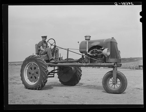 Tractor bought by FSA (Farm Security Administration) loan to German-Russian family in Sheridan County, Kansas. Mr. Schoenfeldt