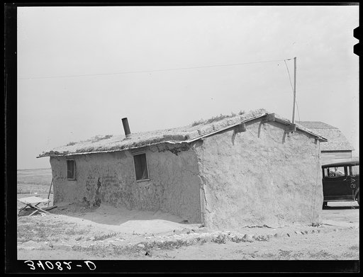 Untitled photo, possibly related to: Sod house of the Schoenfeldts, FSA (Farm Security Administration) clients. Sheridan County, Kansas