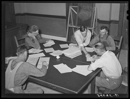FSA (Farm Security Administration) supervisor explaining plans to clients. Sheridan County, Kansas