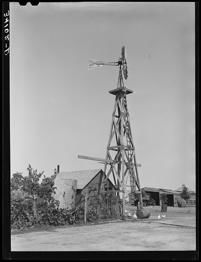 Windmill on farm of William Rall, FSA (Farm Security Administration) client in Sheridan County, Kansas