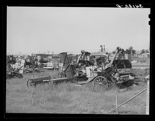 Untitled photo, possibly related to: Junkyard of agricultural implements near Syracuse, Kansas