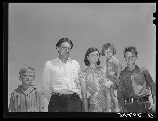 Mrs. Ernest W. Kirk Jr., wife of successful client, with her daughter on farm near Ordway, Colorado