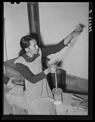 Spanish-American woman spinning woolen thread at WPA (Works Progress Administration/Work Projects Administration) project. Costilla, New Mexico