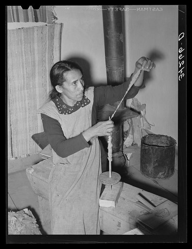 Spanish-American woman spinning woolen thread at WPA (Works Progress Administration/Work Projects Administration) project. Costilla, New Mexico