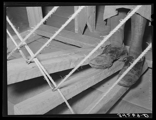 Feet of Spanish-American woman on the pedal of loom. WPA (Works Progress Administration/Work Projects Administration) project. Costilla, New Mexico