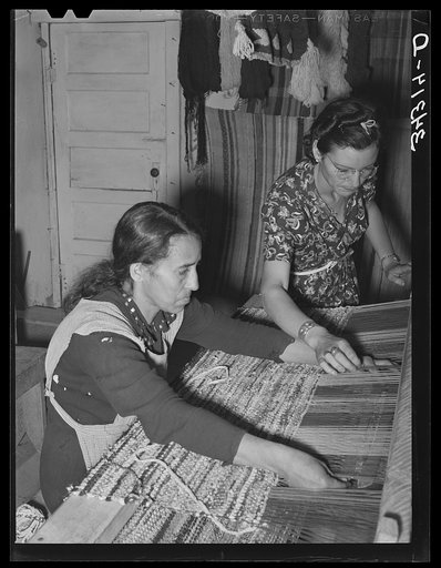 Spanish-American woman weaving rag rug at WPA (Works Progress Administration/Work Projects Administration) project. Costilla, New Mexico