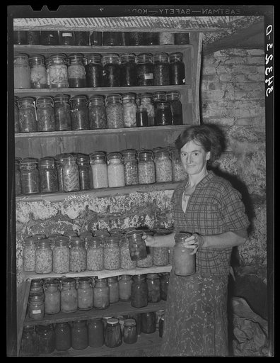 FSA (Farm Security Administration) client with canned goods. Farm, Bradford, Vermont, Orange County