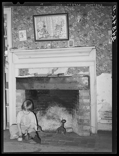 Fireplace in farm home of FSA (Farm Security Administration) client near Bradford, Vermont. Orange County