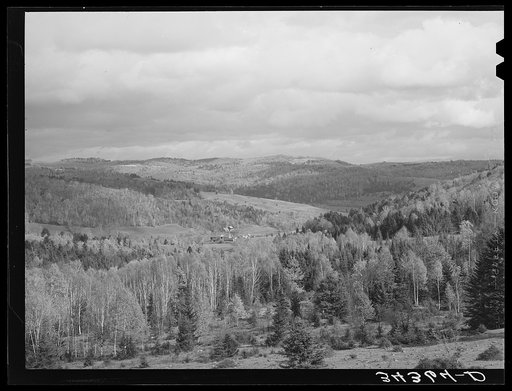 Farmhouse nesting in the hills of Vermont near Bradford, Orange County