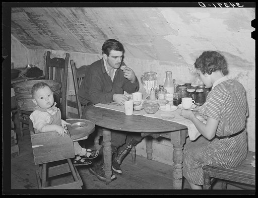 Son of family with his wife and child who live in an impoverished apartment on second floor of his family house. Orange County, near Bradford, Vermont